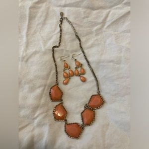 Women’s boutique Gold and Peach Necklace and Earrings.